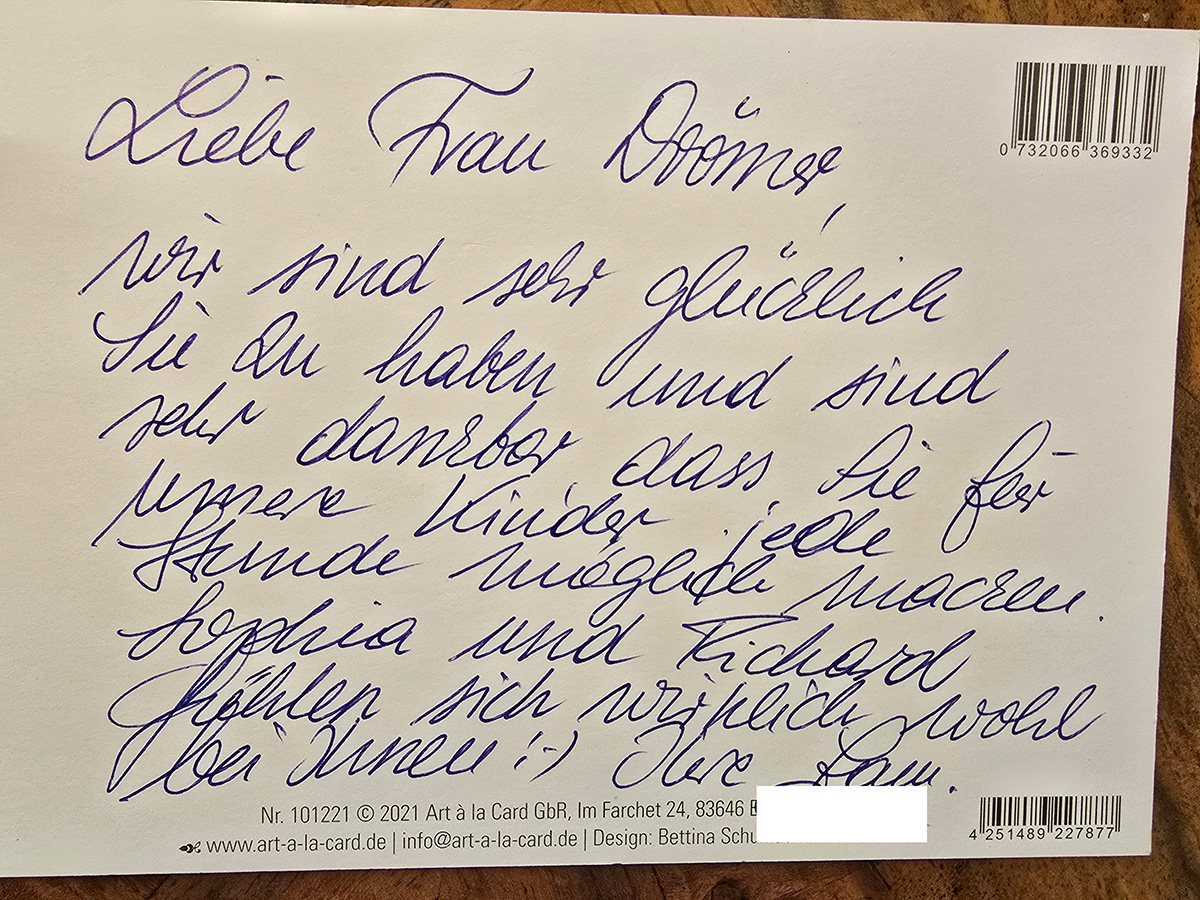 Rezesionstext auf einer Postkarte